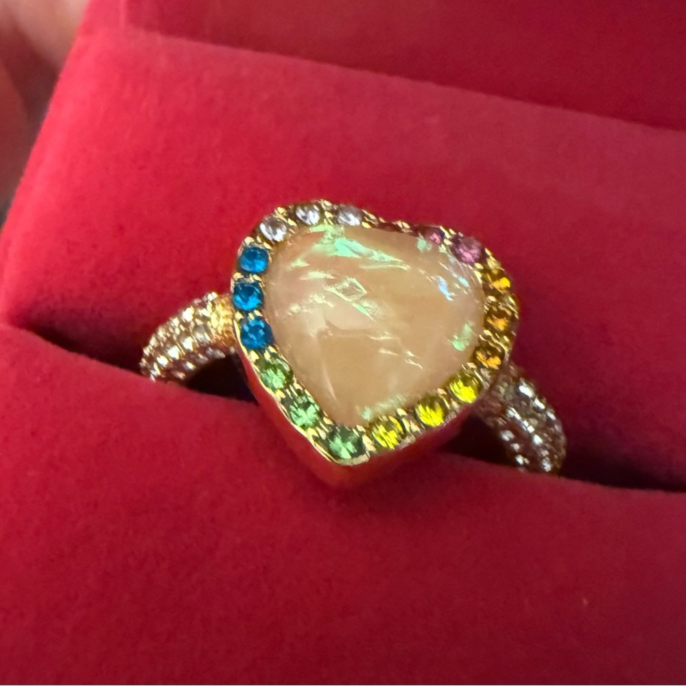 Kurt Geiger Gold Heart Ring with Opalescent Center and Rainbow Stones.  Size 8